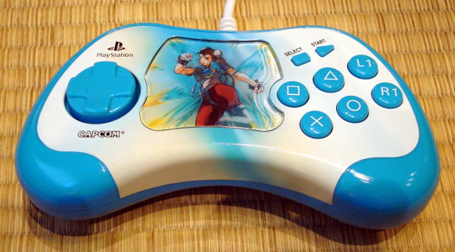 Chun Li Street Fighter 15th controller. Photo of Street Fighter controller.